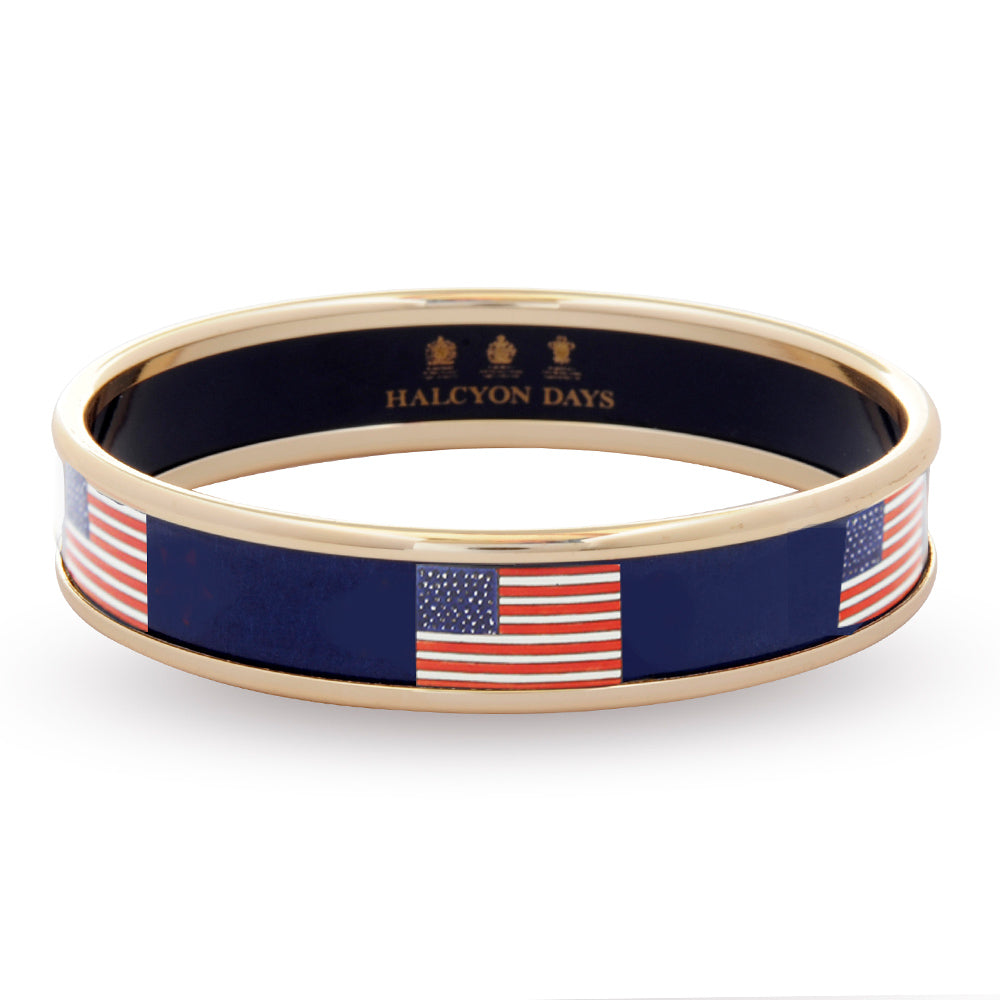 Halcyon Days navy enamel bangle with USA flag illustrations and gold rims